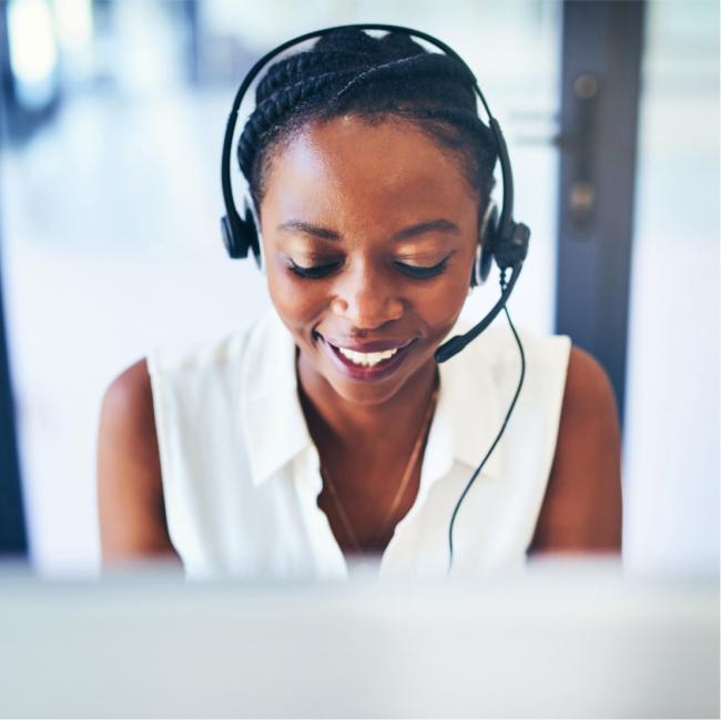 woman tech support with headphones